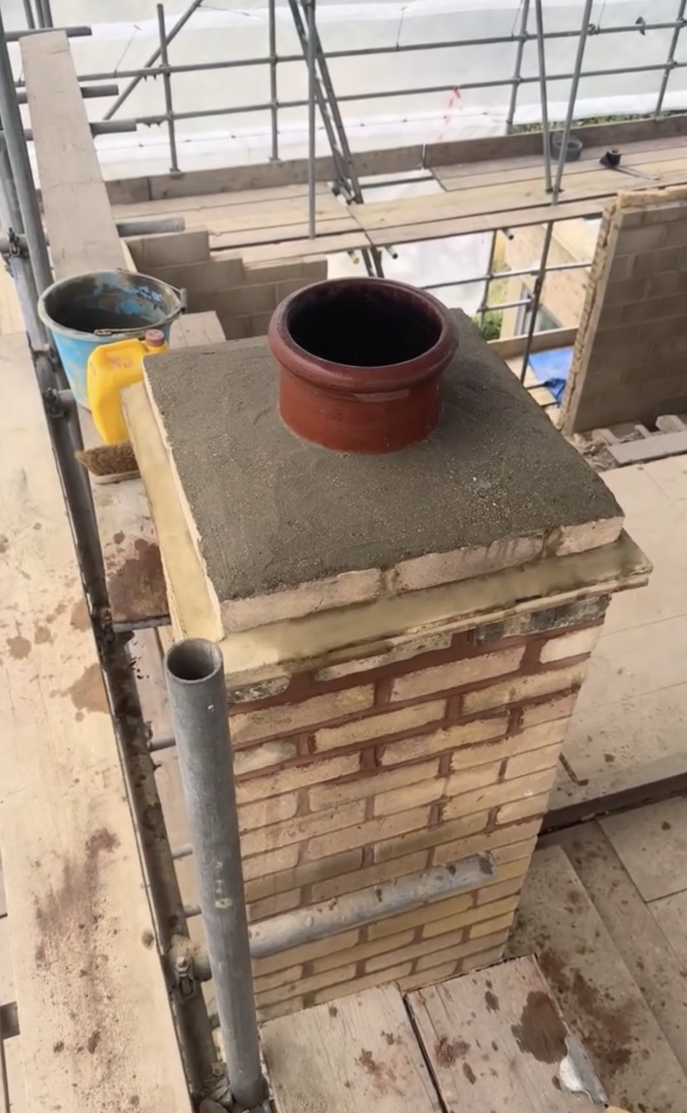 Rebuilt brick chimney stack by Nelhams and Sons near Staines
